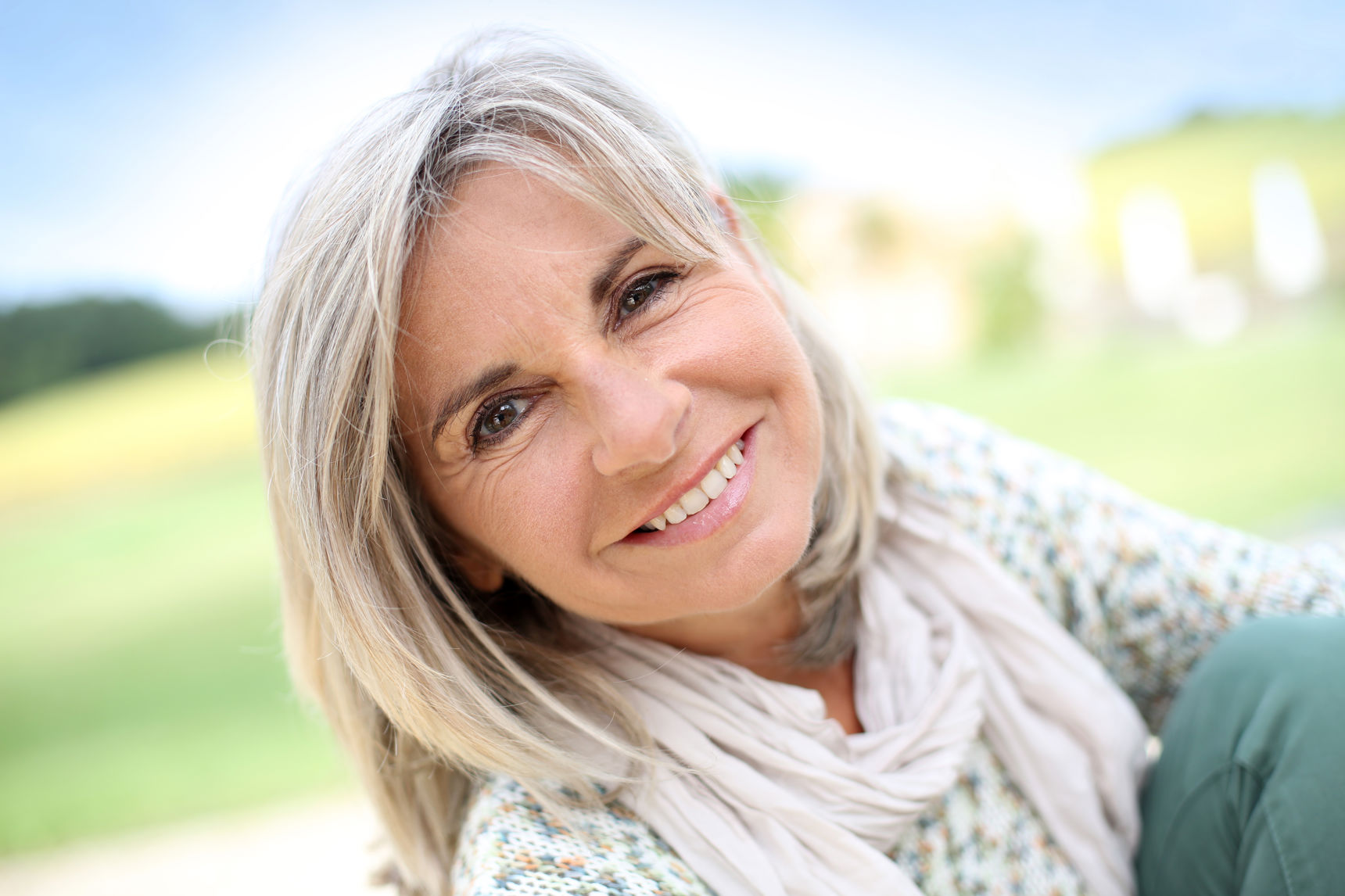 Foto af kvinde der smiler